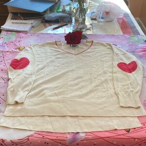 Studio Cream V-Neck Sweater with Red Trim